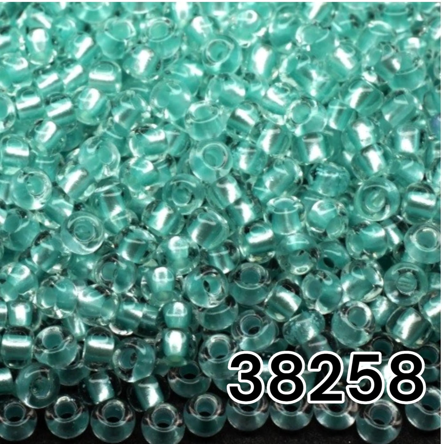 38258 Czech seed beads PRECIOSA Rocailles 10/0 turquoise. Crystal - Terra Pearl Lined.