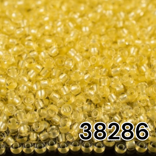 38286 Rocailles tchèques PRECIOSA Rocailles 10/0 jaune. Cristal – Terra Pearl doublé.