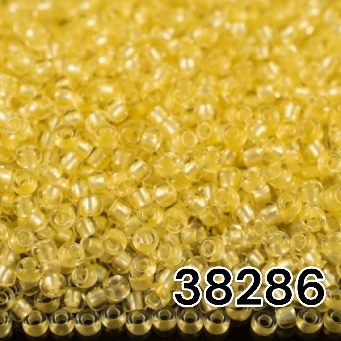 38286 Rocailles tchèques PRECIOSA Rocailles 10/0 jaune. Cristal – Terra Pearl doublé.