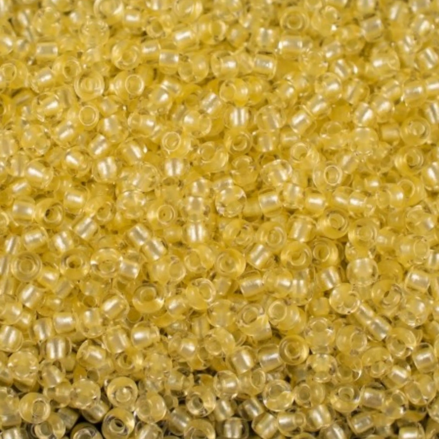 38286 Tschechische Rocailles PRECIOSA Rocailles 10/0 gelb. Kristall – Terra Pearl gefüttert.