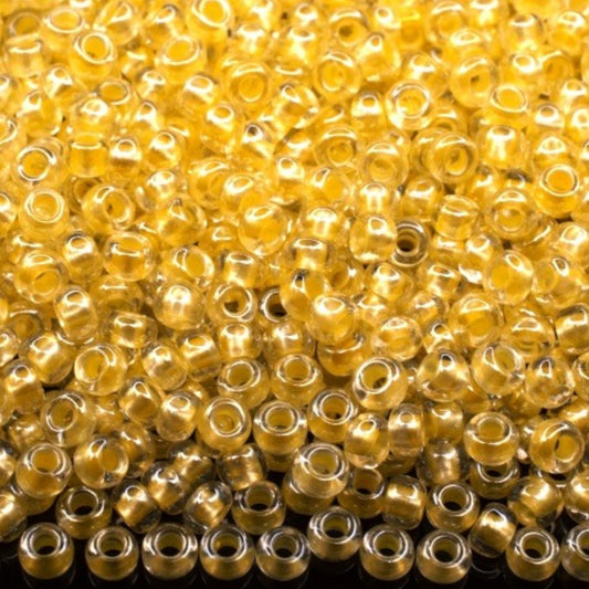 10/0 382PY Preciosa Czech Seed Beads Rocailles 2.3mm. Colour Lined Yellow Pearl, Sfinx.