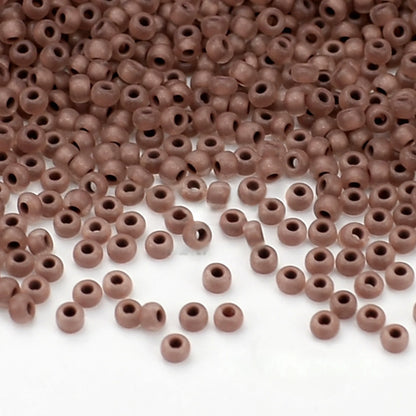 10/0 38319 Matte Preciosa tsjekkiske glass små perler rocailleperler 2,3 mm. Krystallfarget med brun matt kjerne.