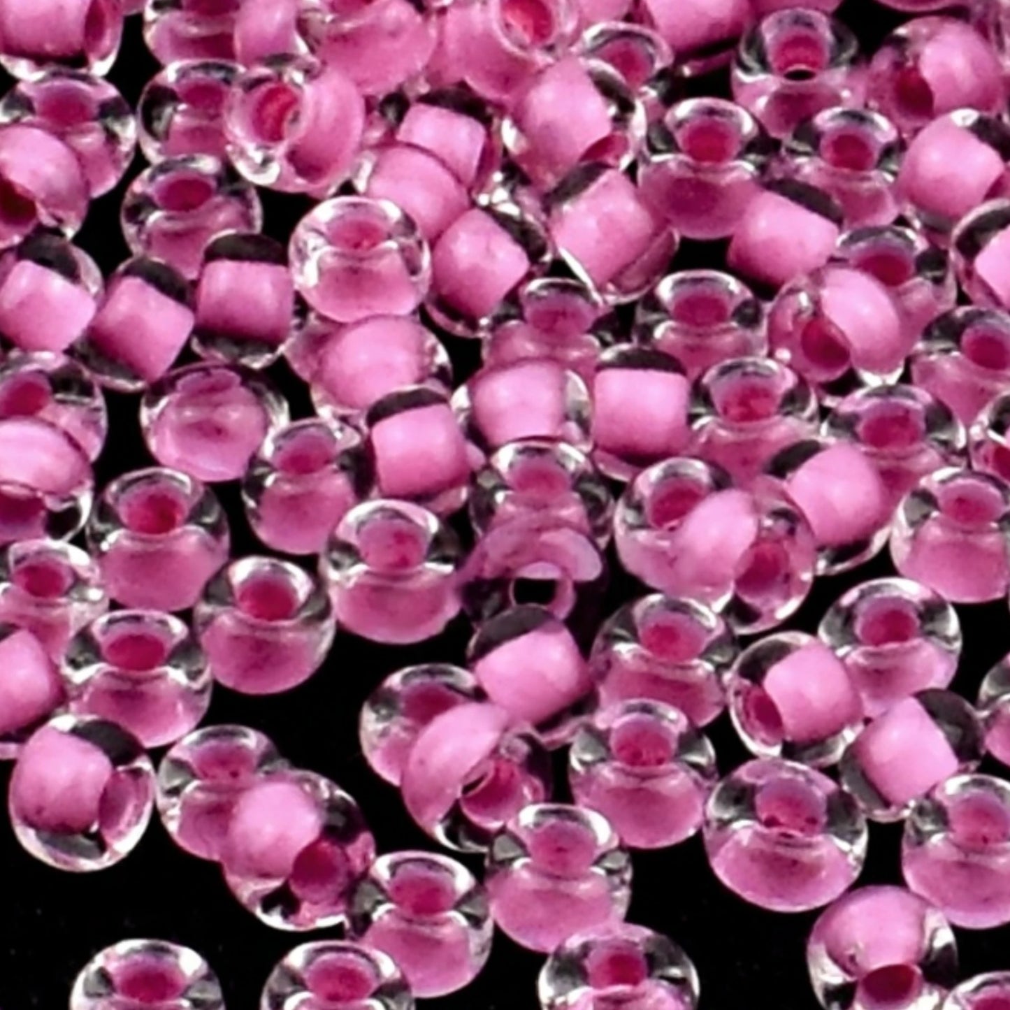 10/0 38325 Preciosa čehu stikla pērlītes rokaja 2.3 mm. Kristāla krāsas ar violetu maliņu.