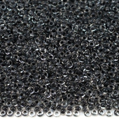 10/0 38349 Preciosa Чешский Стеклянный Бисер Рокайль 2.3 мм. Кристальный цвет с черной подложкой.