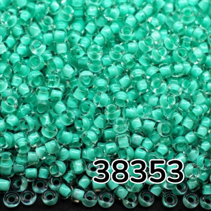 10/0 38353 Preciosa Чеський Скляний Бісер Рокайль 2.3 мм. Кришталевий Колір із Зеленим Покриттям.