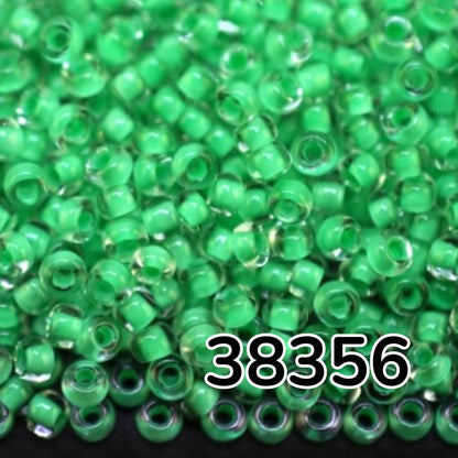 10/0 38356 Preciosa Чеський Скляний Бісер Рокайль 2.3 мм. Кришталевий Колір із Зеленим Покриттям.