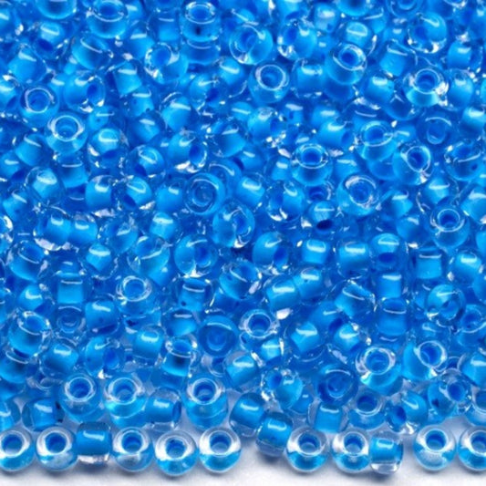 10/0 38365 Preciosa tšekkiläiset lasisiemenhelmet rokaanihelmet 2,3 mm. Kristallin värinen sininen sisävuorattu.