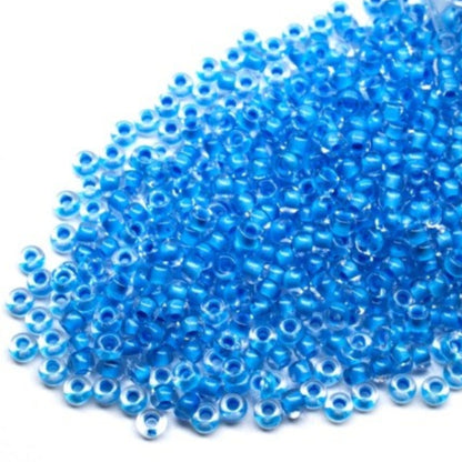 10/0 38365 Preciosa Чеський Скляний Бісер Рокайль 2,3 мм. Кришталевий колір з синьою підкладкою.