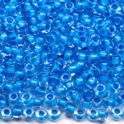 10/0 38365 Preciosa Чеський Скляний Бісер Рокайль 2,3 мм. Кришталевий колір з синьою підкладкою.