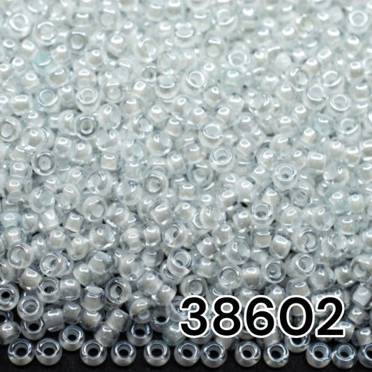 10/0 38602 Preciosa Seed Beads Rocailles. White Lined Sfinx.