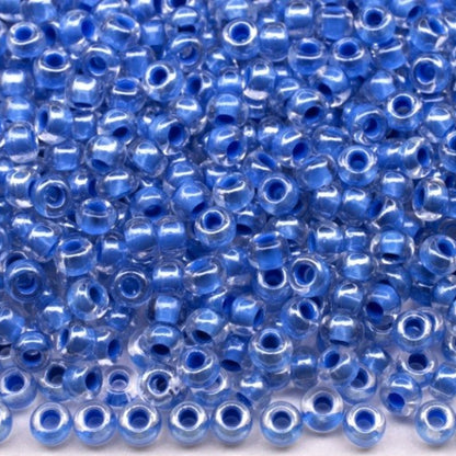 10/0 38638 Preciosa czeskie szklane koraliki Rocailles 2,3 mm. Kryształowy kolor z niebieską obwódką Sfinx.