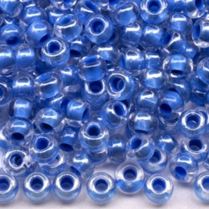 10/0 38638 Preciosa czeskie szklane koraliki Rocailles 2,3 mm. Kryształowy kolor z niebieską obwódką Sfinx.