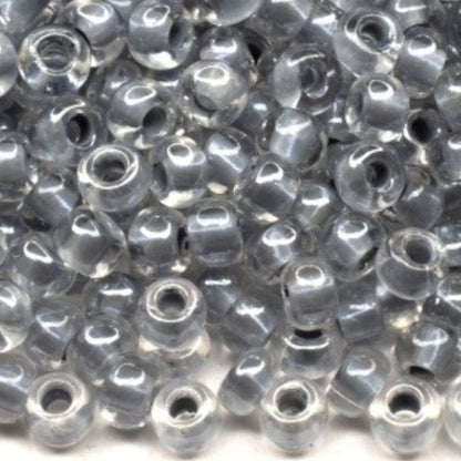 10/0 38642 Perles en verre tchèque Preciosa de Rocaille 2,3 mm. Couleur cristal bordée gris Sfinx.