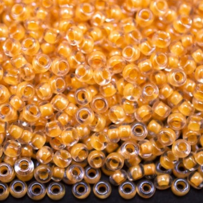10/0 38683 Perles de Rocaille en verre tchèque Preciosa 2,3 mm. Couleur cristal doublée jaune Sfinx.