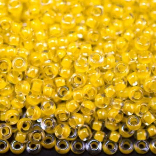 10/0 38686 Preciosa czeskie szklane koraliki Rocailles 2,3 mm. Kryształowy kolor z żółtą powłoką Sfinx.