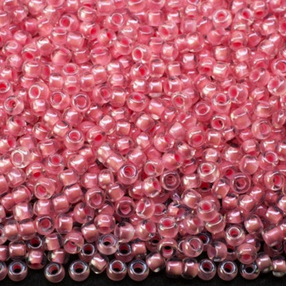 10/0 38694 Perline di Vetro Ceco Preciosa Rocaille 2,3 mm. Colore Cristallo con Finitura Rosa Sfinx.