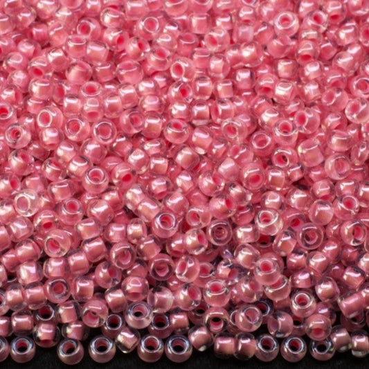 10/0 38694 Preciosa czeskie szklane koraliki Rocailles 2,3 mm. Kryształowy kolor z różową powłoką Sfinks.