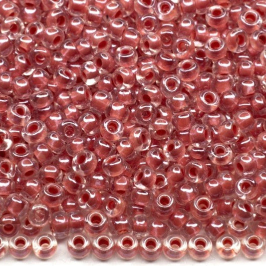 10/0 38695 Preciosa czeskie szklane koraliki Rocailles 2,3 mm. Kryształowy kolor z czerwonym wykończeniem Sfinx.