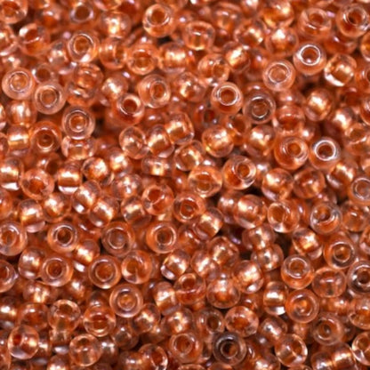 10/0 38918 Preciosa Seed Beads. Crystal - Terra Pearl Lined.