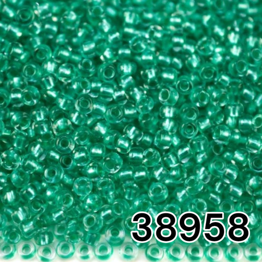 38958 Tschechische Rocailles PRECIOSA Rocailles 10/0 türkis. Kristall – Terra Pearl gefüttert.