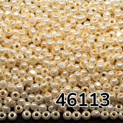 Perles de Rocaille en verre tchèque Preciosa 6/0 46113, 4,1 mm. Coquille beige.