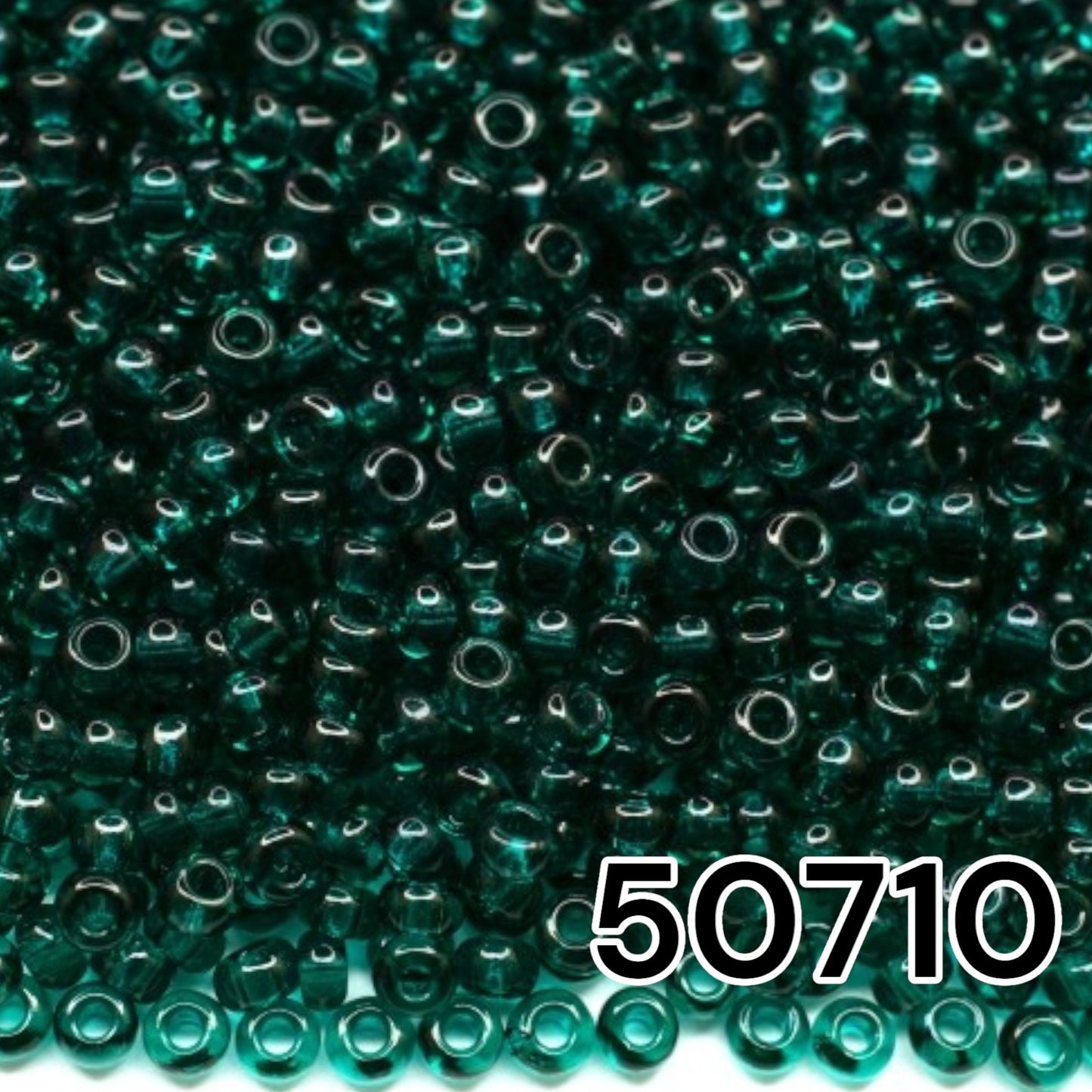 10/0 50710 Perles de graines Preciosa. Vert Transparent naturel.