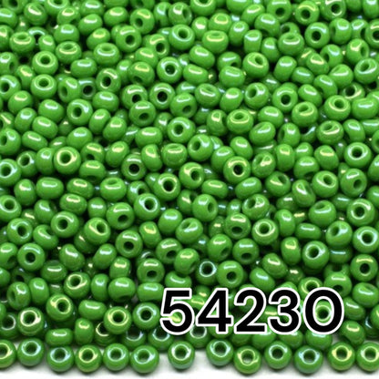 10/0 54230 Preciosa Seed Beads. Opaque rainbow green.