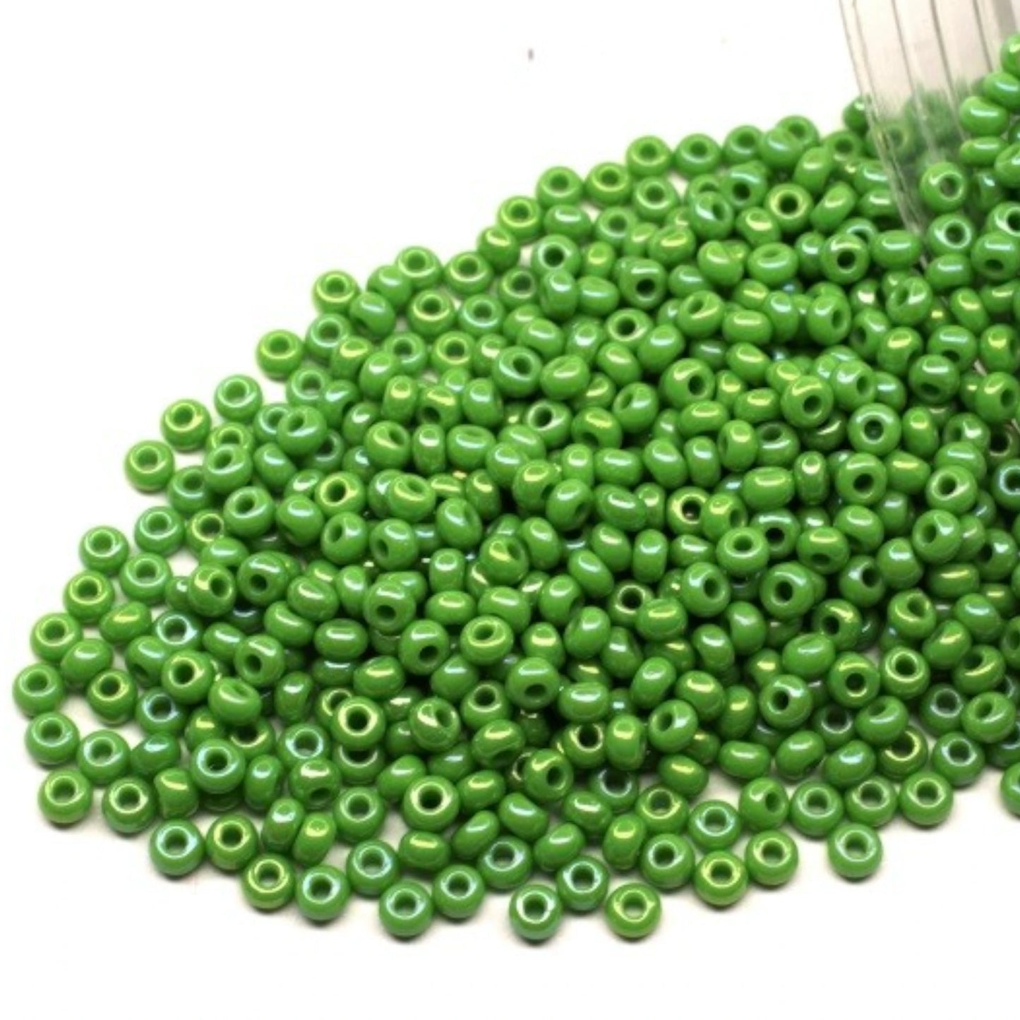 10/0 54230 Preciosa Seed Beads. Opaque rainbow green.