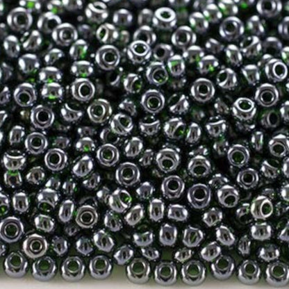 10/0 56150 Preciosa Perline di vetro ceche Rocaille 2.3mm. Verde scuro trasparente Sfinx.