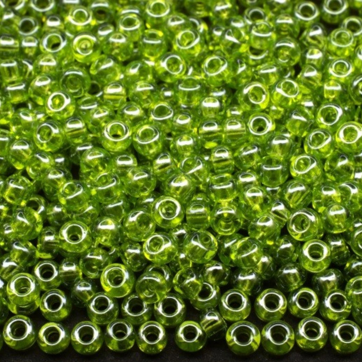 10/0 56220 Preciosa Perline di vetro ceche Rocaille 2.3mm. Verde trasparente Sfinx.
