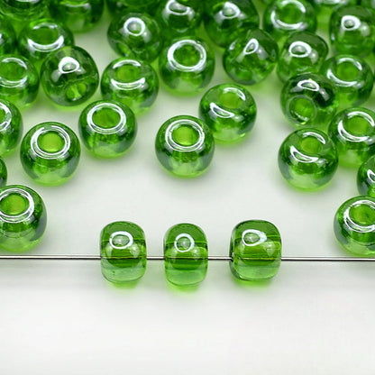 2/0 56430 Preciosa Czech Glass Koraliki Rocailles 6.1mm. Zielony Transparentny Sfinx.