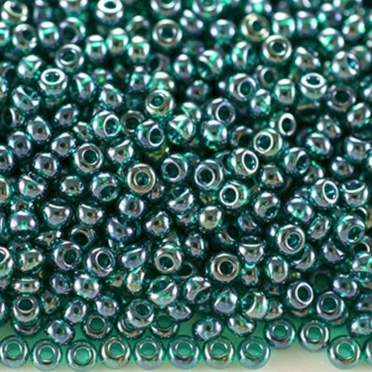 10/0 56710 Preciosa Tschechische Glasperlen Rocailles 2.3mm. Blaugrün Transparent Sfinx.
