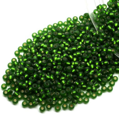 10/0 57120matte Preciosa Seed Beads. Green transparent Silver lined.