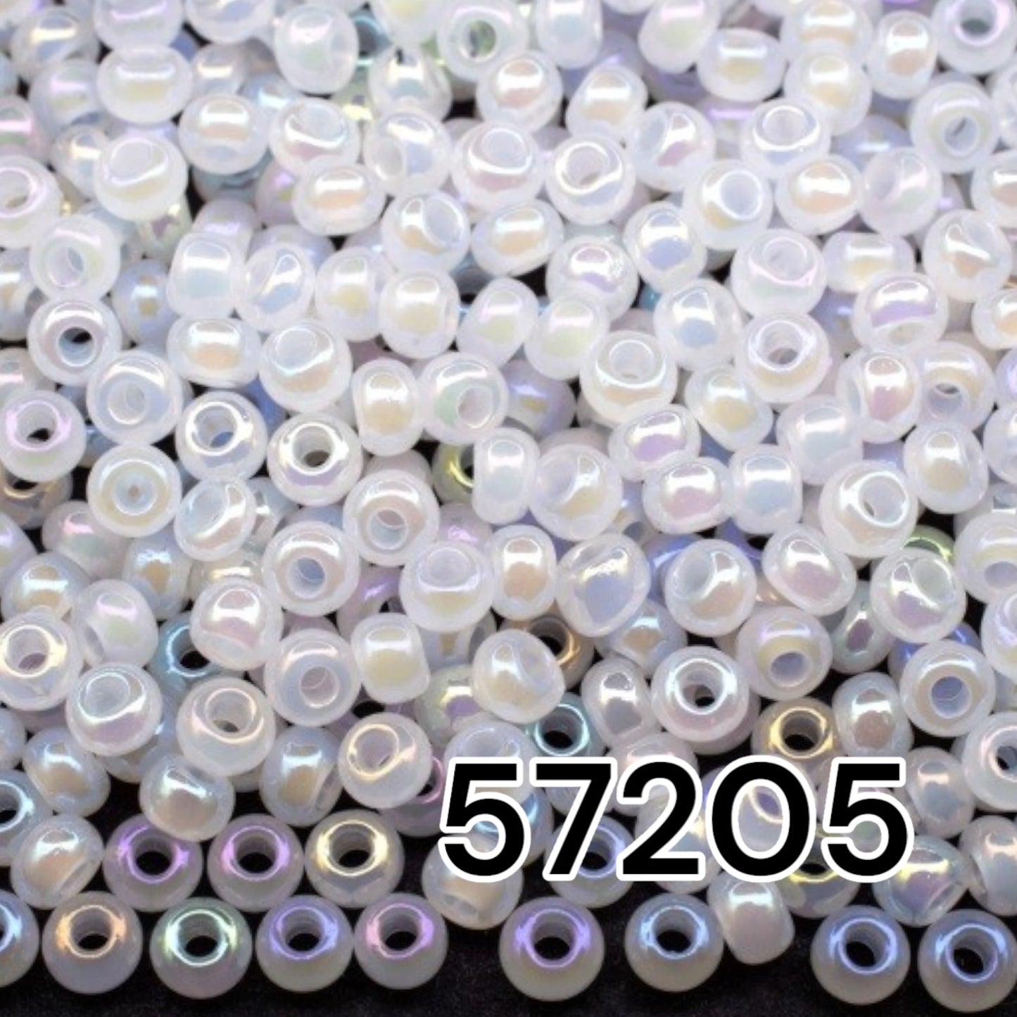 10/0 57205 Preciosa Seed Beads. Opaque rainbow white.