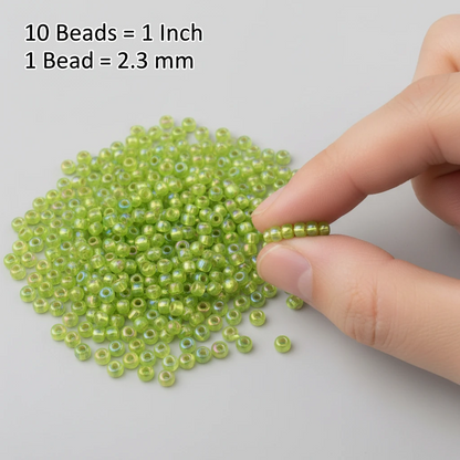 10/0 57229 Preciosa Missangas/Miçangas Pequenas (contas miúdas) de vidro checo Rocaille 2.3mm. Verde-claro transparente com interior prateado, arco-íris.