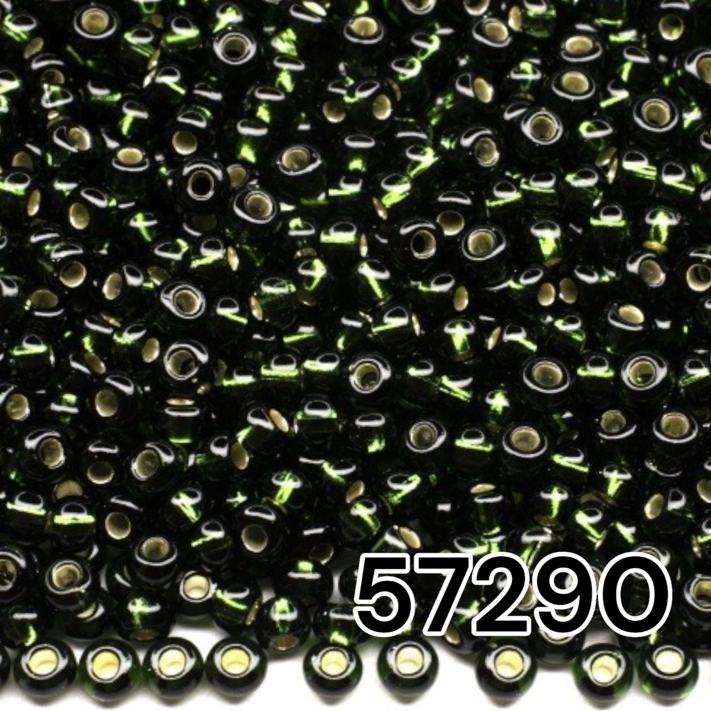 10/0 57290 Preciosa Seed Beads. Green transparent Silver lined.