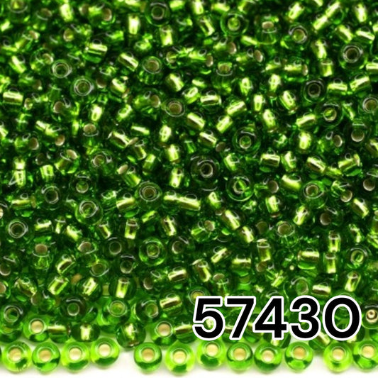 10/0 57430 Perles de graines Preciosa. Vert transparent doublé argent.