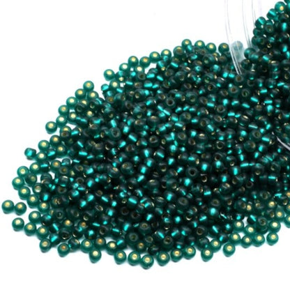10/0 57710matte Preciosa Seed Beads. Green Blue transparent Silver lined.