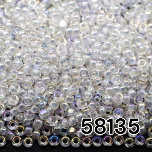 10/0 58135 Preciosa Seed Beads Rocailles White. Transparent Rainbow.