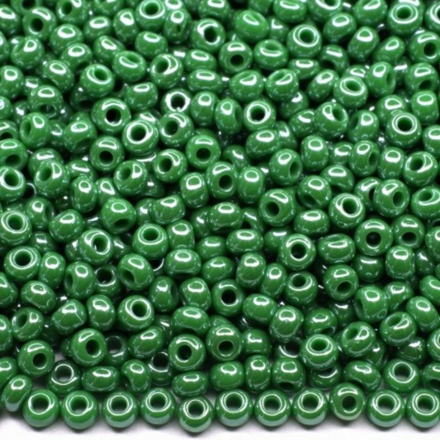 10/0 58250 Preciosa Seed Beads. Opaque Sfinx green.