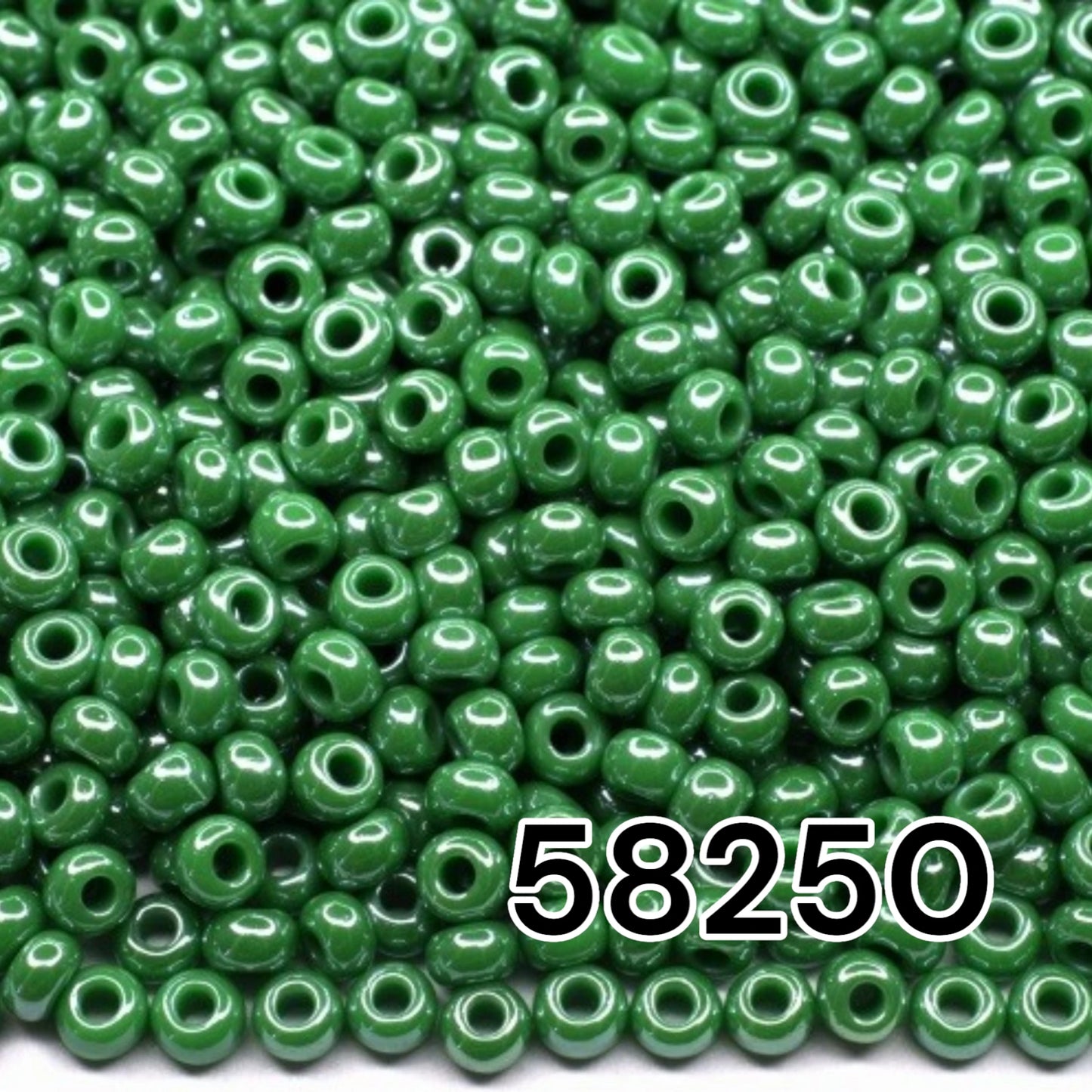 10/0 58250 Preciosa Seed Beads. Opaque Sfinx green.