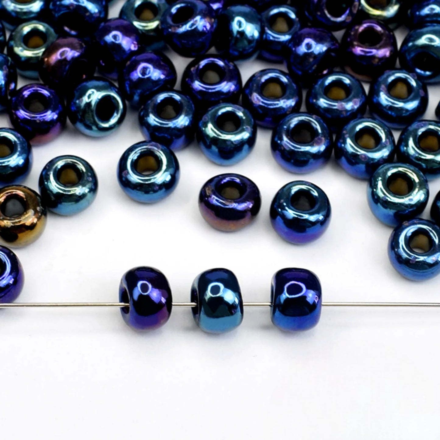 2/0 59135 Preciosa Seed Beads. Opaque Iris.