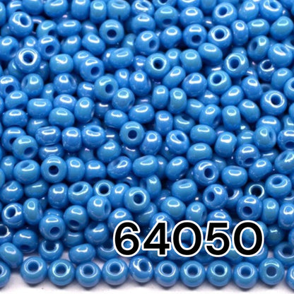 10/0 64050 Preciosa Seed Beads. Opaque rainbow blue.