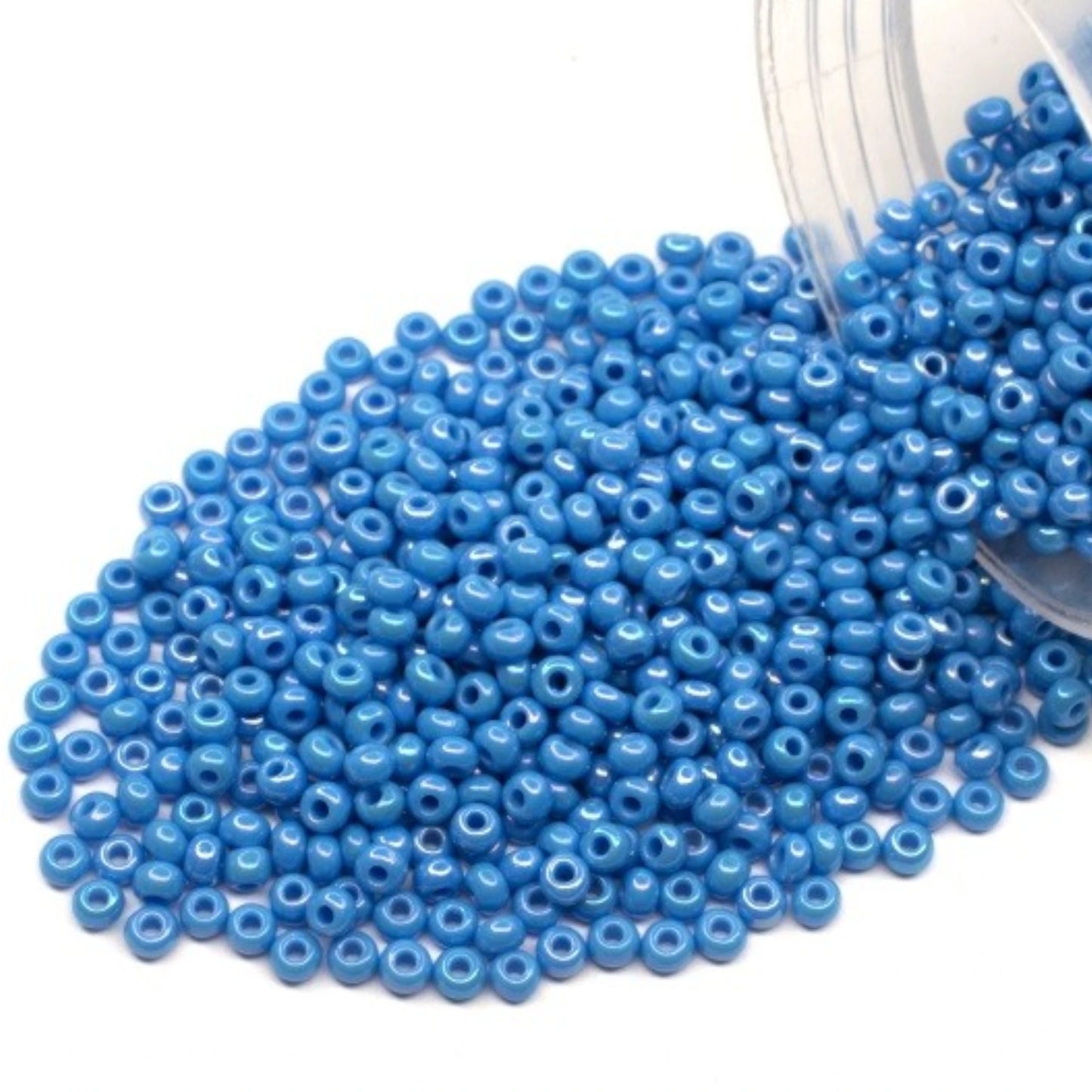 10/0 64050 Preciosa Seed Beads. Opaque rainbow blue.