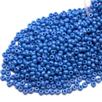 10/0 64080 Preciosa Seed Beads. Opaque rainbow blue.