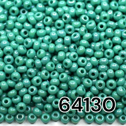 10/0 64130 Preciosa Seed Beads. Opaque rainbow blue green.