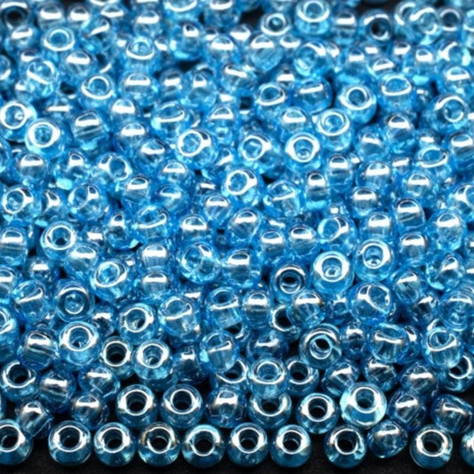 10/0 66000 Preciosa tjekkiske glasperler Rocailles 2.3mm. Akvamarin transparent Sfinx.