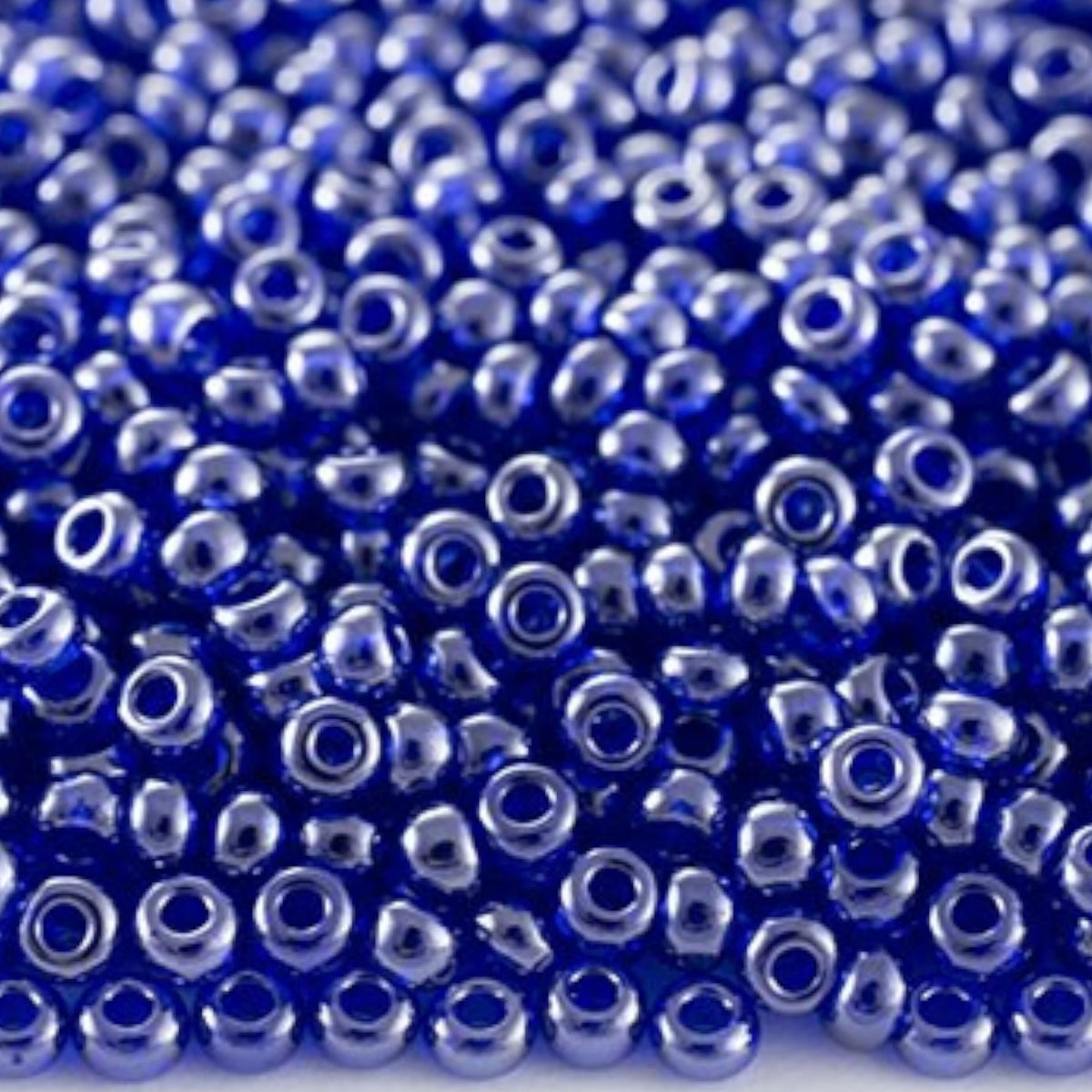 10/0 66300 Preciosa Perline di vetro ceche Rocaille 2.3mm. Acquamarina scuro trasparente Sfinx.