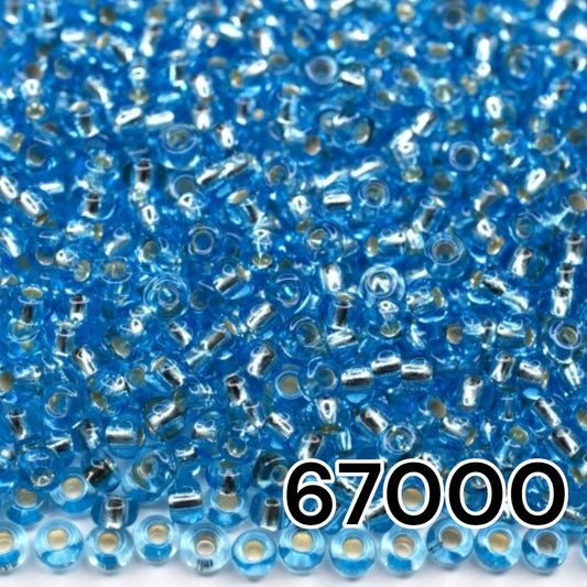 10/0 67000 perles de rocaille Preciosa. Bleu clair transparent doublé argent.