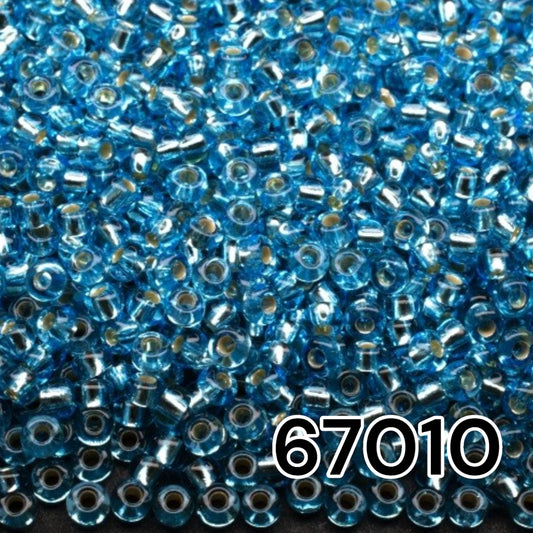 10/0 67010 Perles de graines Preciosa. Bleu clair transparent doublé argent.